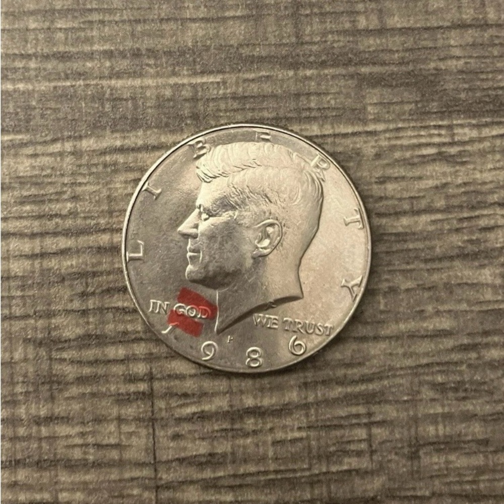 1986 Kennedy half error line thru GOD